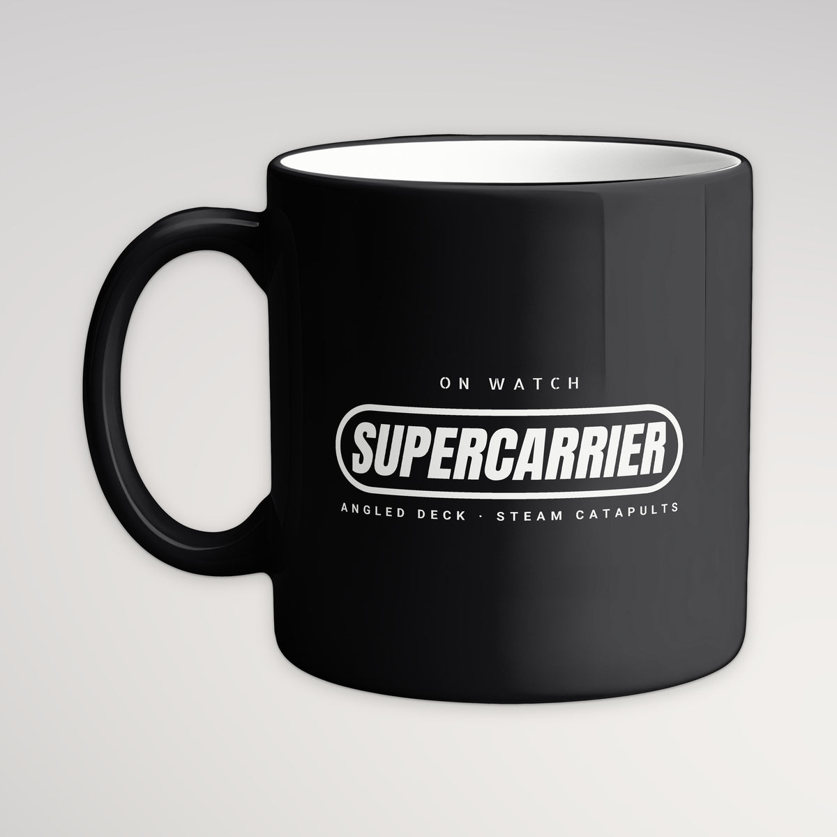 Supercarrier Watch Pill Mug, black mug, handle left