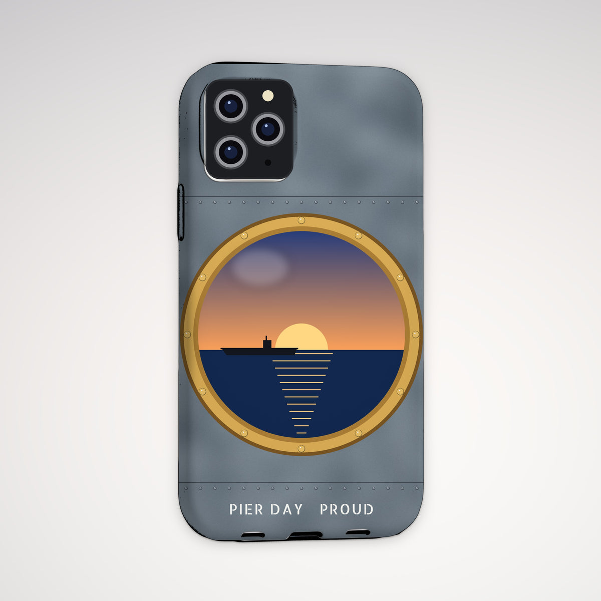 Brass Porthole Tough Phone Case – iPhone, shown on a Pro model